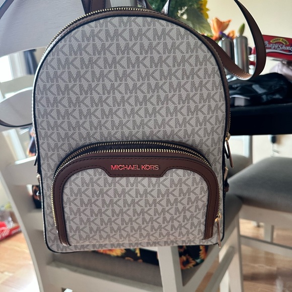 Brand new MK backpack purse! Purchased on 11/17/23 l. Receipt proof attached. - Picture 5 of 5